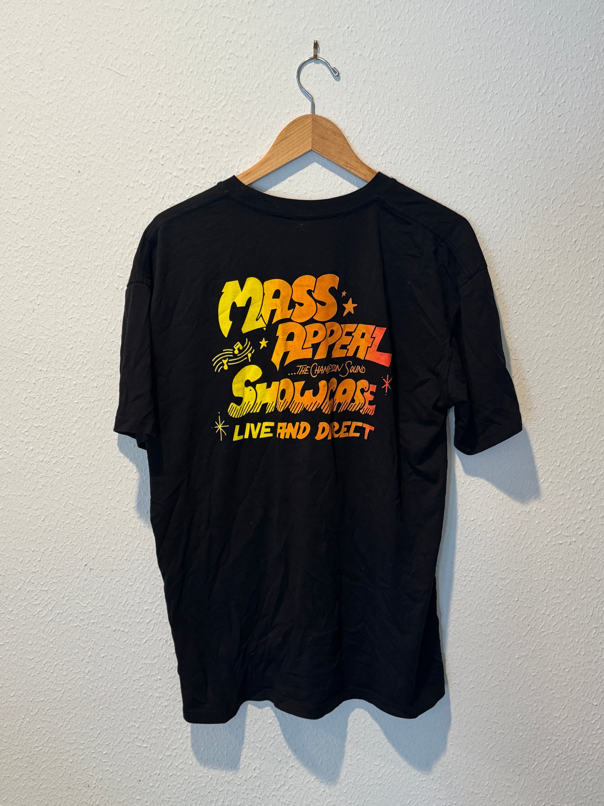Black tank top with colorful text on a white background